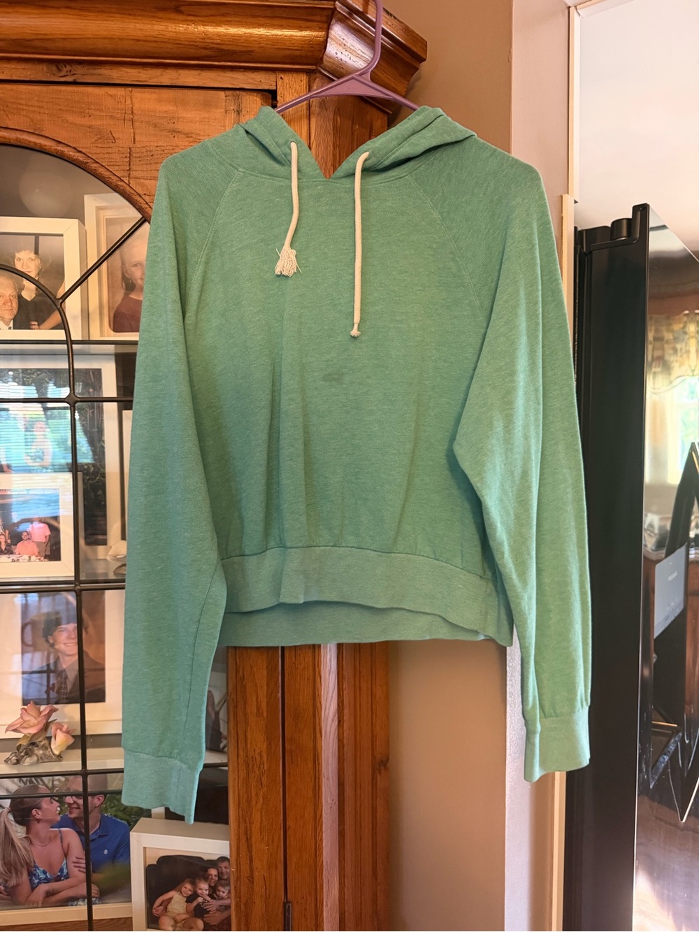 Large Women's Green Hoodie Sweatshirt. Spot see pic. MUST BE BUNDLED